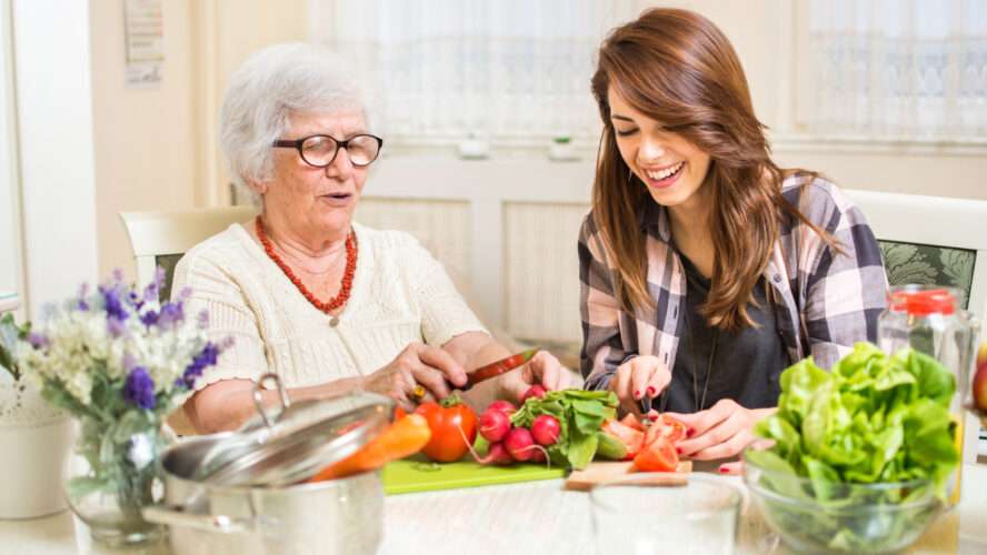 How can families help seniors with daily living tasks?